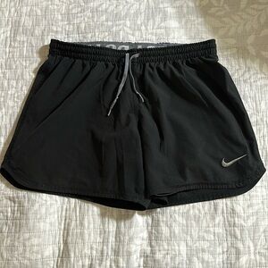 Nike women’s size small dri-fit running shorts with liner.